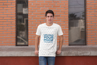 Mockup of a Young Man Wearing a T-Shirt in the City