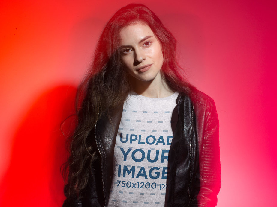 Blurred T-Shirt Mockup Featuring a Woman in a Red Room