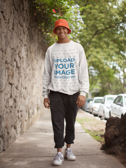 Crewneck Sweater Mockup Featuring a Happy Man Walking Down the Street