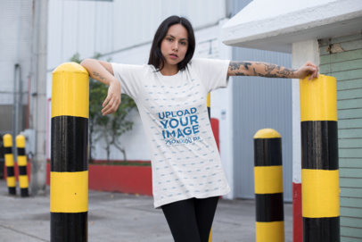 T-Shirt Mockup of an Edgy Woman at a Parking Entrance