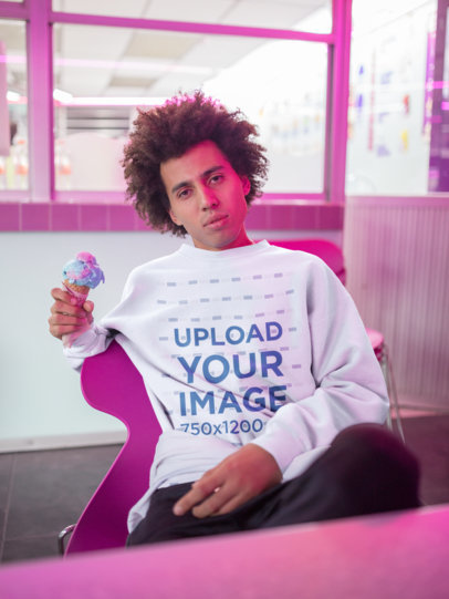 Sweater Mockup of a Young Man Holding an Ice Cream 