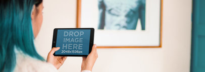 iPad Mockup Template of a Young Designer at a Creative Studio