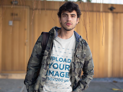 T-Shirt Mockup of Young Man Posing in Front of a House
