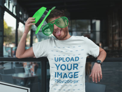 T-Shirt Mockup of a Man at a Bar in Saint Patrick's Day