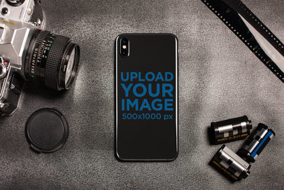 Mockup of a Phone Sticker Surrounded by Photography Accessories