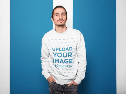 Sweatshirt Mockup of a Hipster Looking Man with a Colored Background 18519