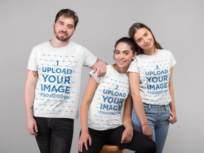 Mockup of Three Friends Wearing Tees in a Studio