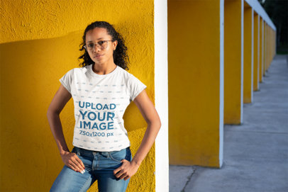 Mockup of a Woman Wearing a T-Shirt with Her Hands on Her Hips