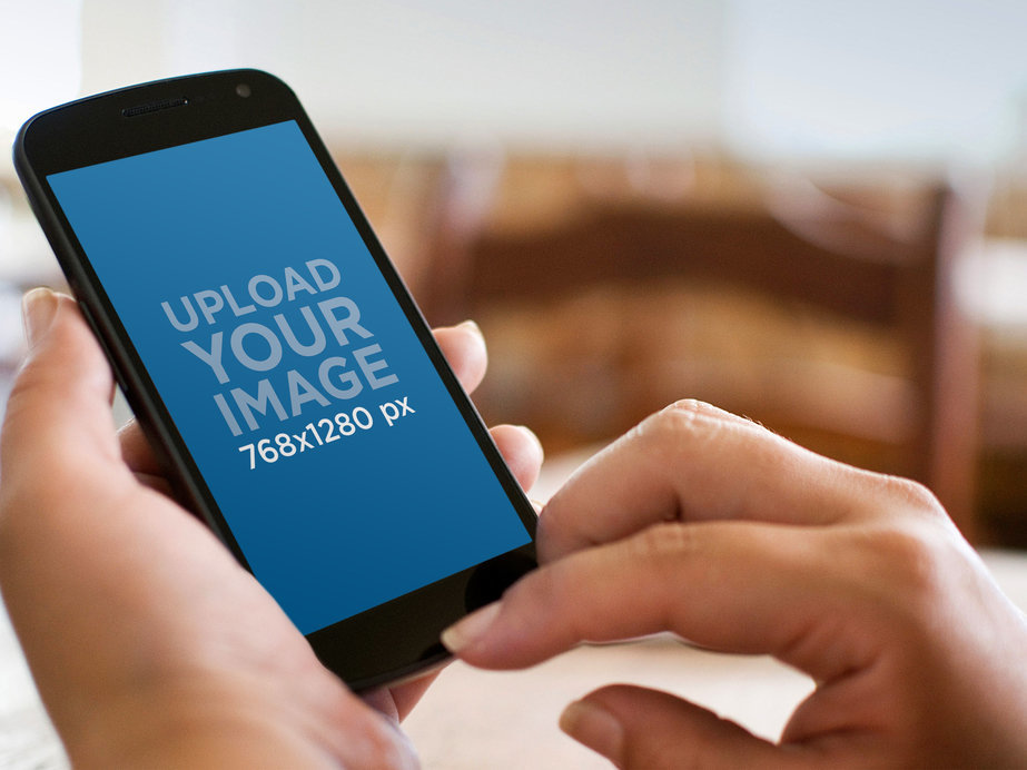 Mockup of a Woman Using a Google Nexus Phone