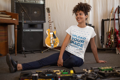 Round Neck Tee Mockup of a Smiling Woman in a Music Studio