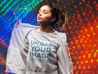 Sweatshirt Mockup of a Cool Girl Surrounded by Colorful Lights 18757