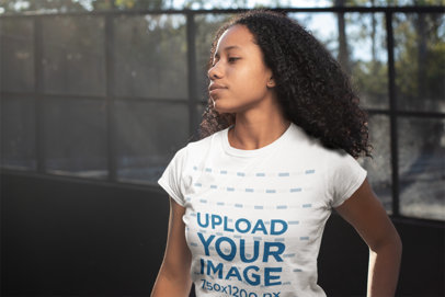 T-Shirt Mockup of a Woman with Afro Kinky Curly Hair