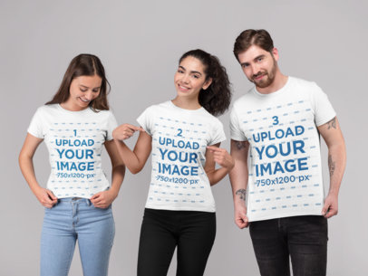 T-Shirt Mockup of a Woman with Two Friends at a Photo Studio