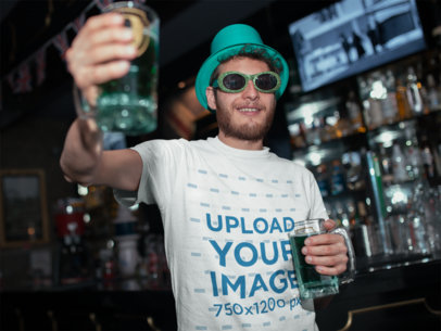 Tee Mockup of a Man Drinking a Beer on St. Patrick's Day
