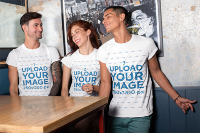 T-Shirt Mockup of Three Friends at a Bar 25255