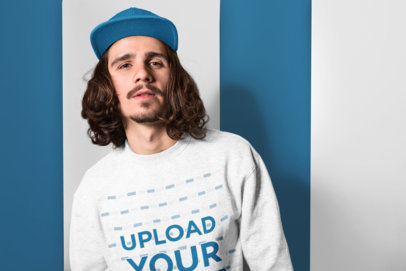 Heather Crewneck Sweatshirt Mockup of a Man Against a Multicolor Wall