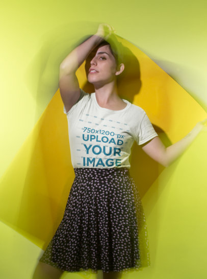 Tshirt Mockup of a Woman Holding a Big Pasteboard on Her Back