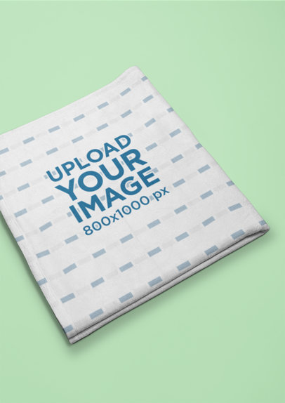 Folded Throw Blanket Mockup of a Solid Color Surface