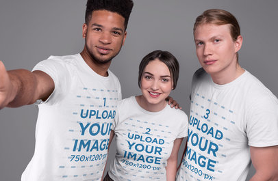 T-Shirt Mockup of a Group of Friends in a Studio