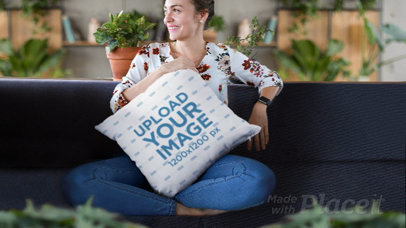 Parallax Video of a Happy Woman Holding a Square Throw Pillow 26019