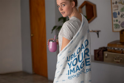 Mockup of a Woman with a Throw Blanket on Her Back