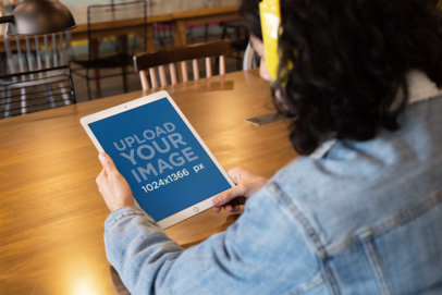 iPad Pro Mockup of a Man Listening to a Podcast