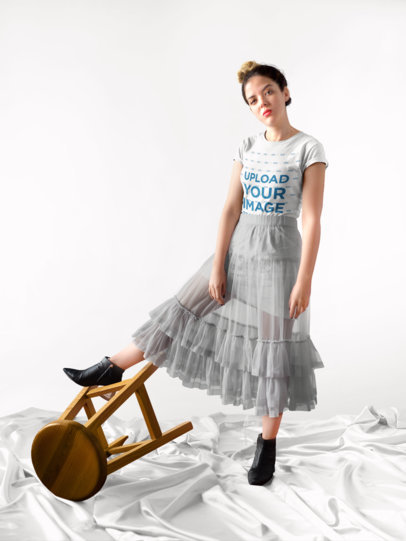 T-Shirt Mockup of a Woman in an Elegant Setting 