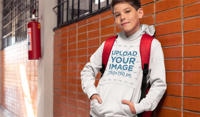 Mockup of a Young Student Wearing a Hoodie at School