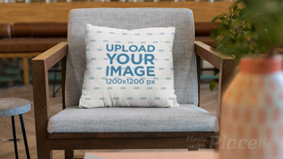 Parallax Video Mockup of a Pillow on an Elegant Wood Chair