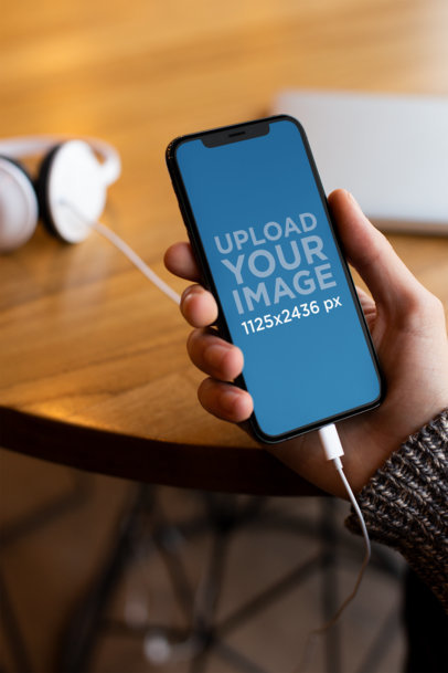 Mockup of an iPhone 11 Pro Playing a Podcast