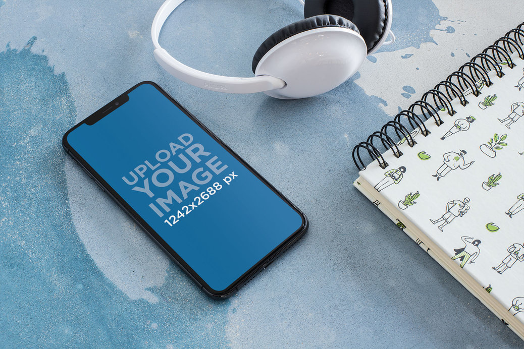 iPhone 11 Pro Mockup for Podcasts Featuring a Pair of White Headphones