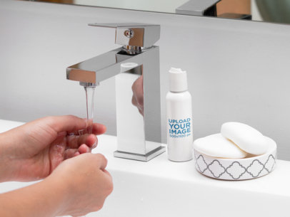Bottle Mockup of a Small Cream on a Bathroom Counter
