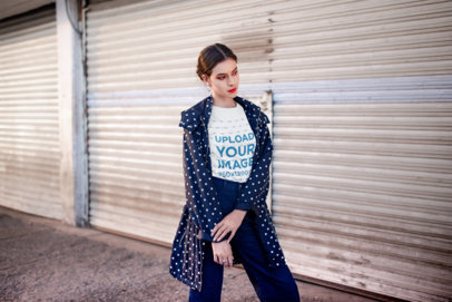 Round Neck Tshirt Mockup Featuring a Woman Outside Closed Stores