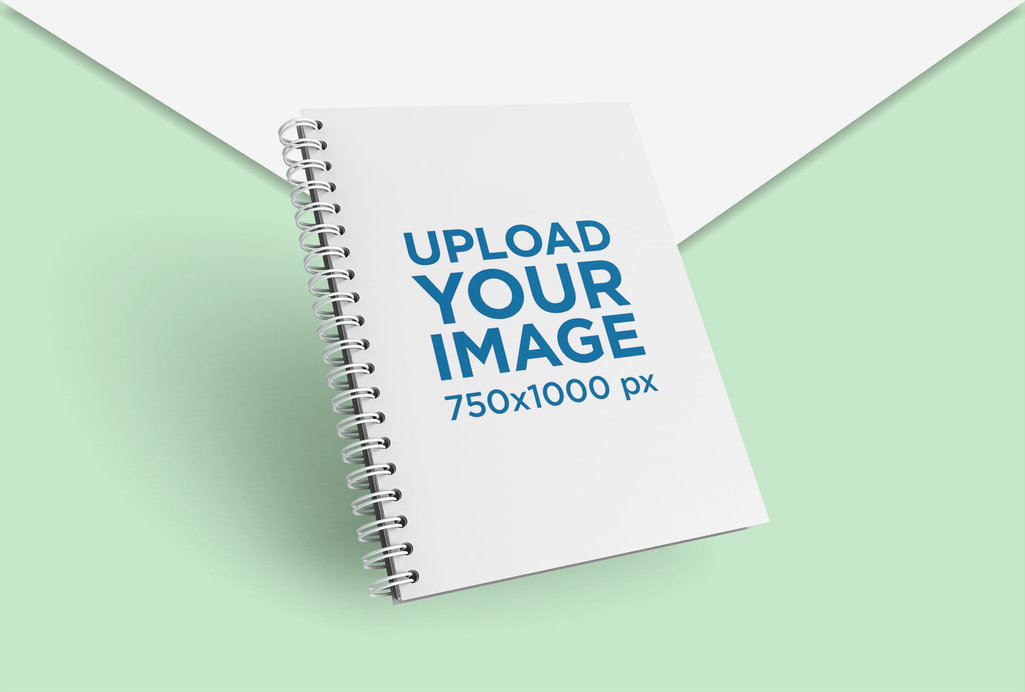 Render Mockup of Spiral Notebook Floating over Bicolor Cardboards