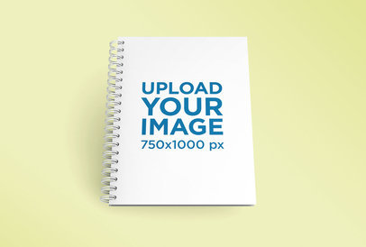 Render Mockup of a Spiral Notebook Lying in the Middle of a Plain Surface 26110