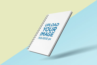 Render Mockup of Spiral Notebook Floating over a Bicolor Surface
