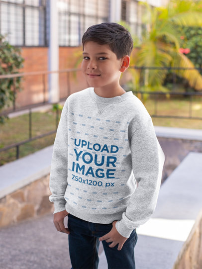 Mockup of a Kid Wearing a Heathered Crewneck Sweatshirt at School