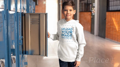 Parallax Video of a Kid Wearing a Pullover Hoodie at School