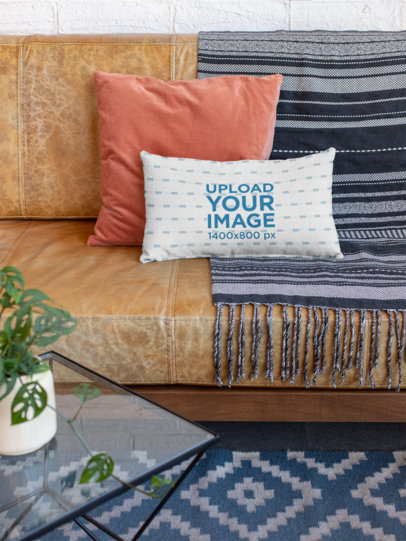 Pillow Mockup on a Leather Sofa in a Living Room Scenario 25906