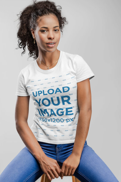 T-Shirt Mockup of a Woman Sitting on a Stool