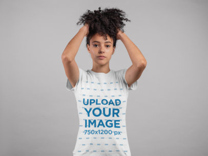 T-Shirt Mockup of a Serious Woman with a Kinky Ponytail 