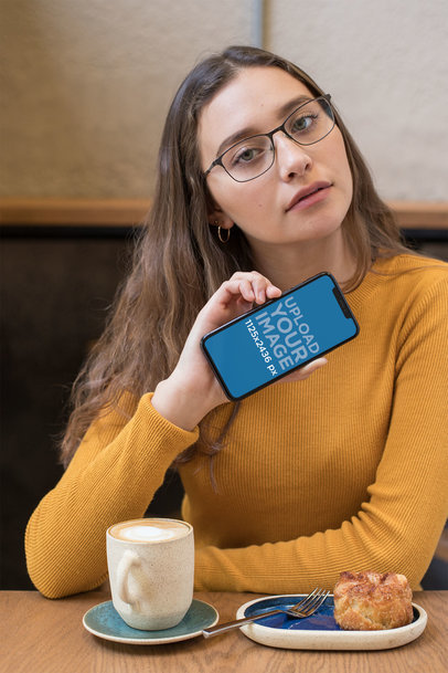 Mockup of a Beautiful Woman Holding an iPhone 11 Pro