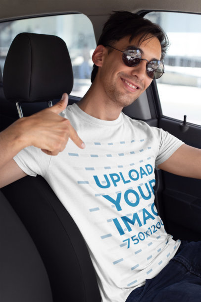 Mockup of a Smiling Driver Showing off His T-Shirt 26221