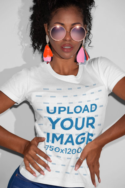 T-Shirt Mockup of a Woman with Cool Sun Glasses Striking a Pose