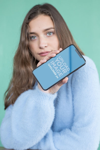 Mockup of a Beautiful Woman Showing an iPhone 11 Pro Max