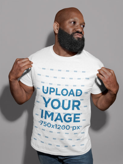 Mockup of a Bearded Man Showing off His T-Shirt