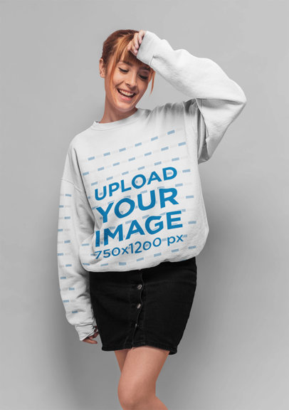 Mockup of a Red Haired Woman with Bangs Wearing a Crewneck Sweatshirt