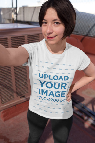 T-Shirt Mockup of a Happy Customer with Bob Haircut Taking a Selfie 26225