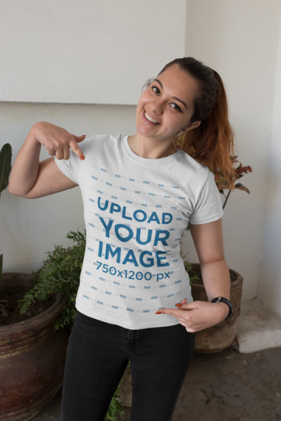 Mockup of a Happy Customer Pointing at Her T-Shirt