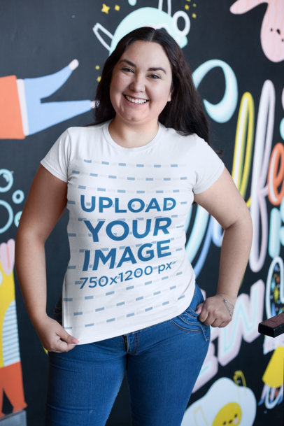 Mockup of a Curvy Woman Wearing a T-Shirt Against a Graffiti Wall 26184